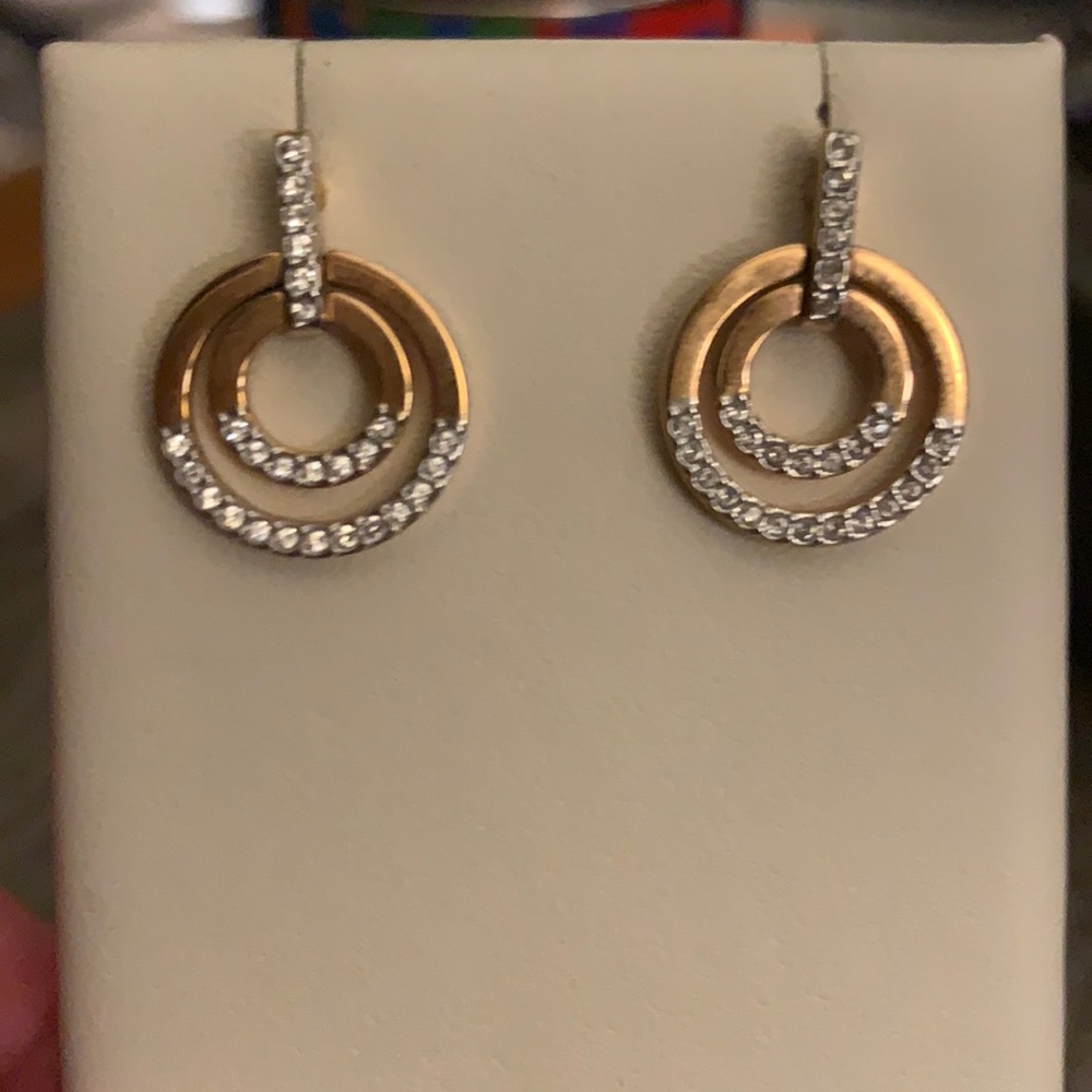 Zeghani rose gold and diamond earrings.